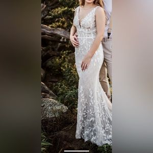 Wedding dress worn once for these pictures for 45 minutes lol…